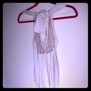 Unique flowing top with bow